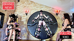 Dominatrixes Jolie Berrie and Lady Emiliana enjoy themselves with their sub on the spin wheel by tickling him